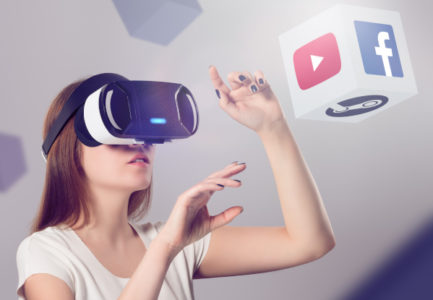 Woman in VR headset looking up and interacting with Facebook You